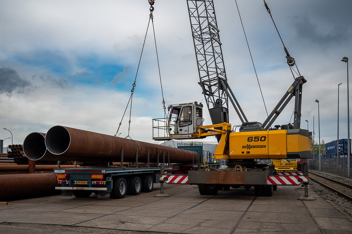Steel mooring piles being lifted
